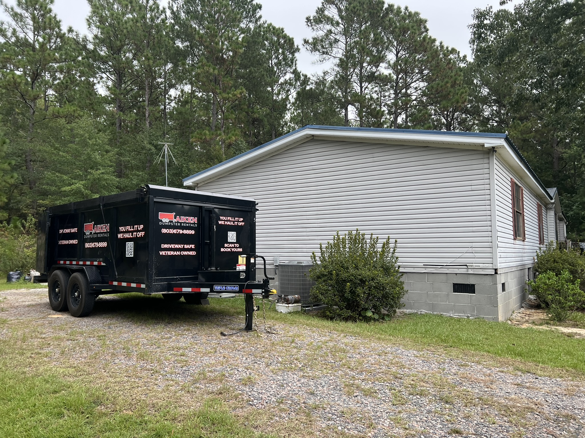 Aiken Dumpster Rentals 15 yard dump trailer at a residential property